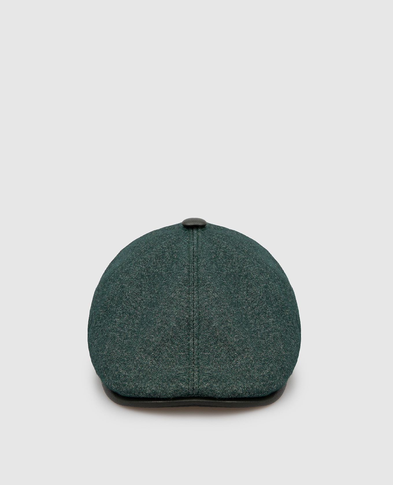 Children's cap with leather inserts