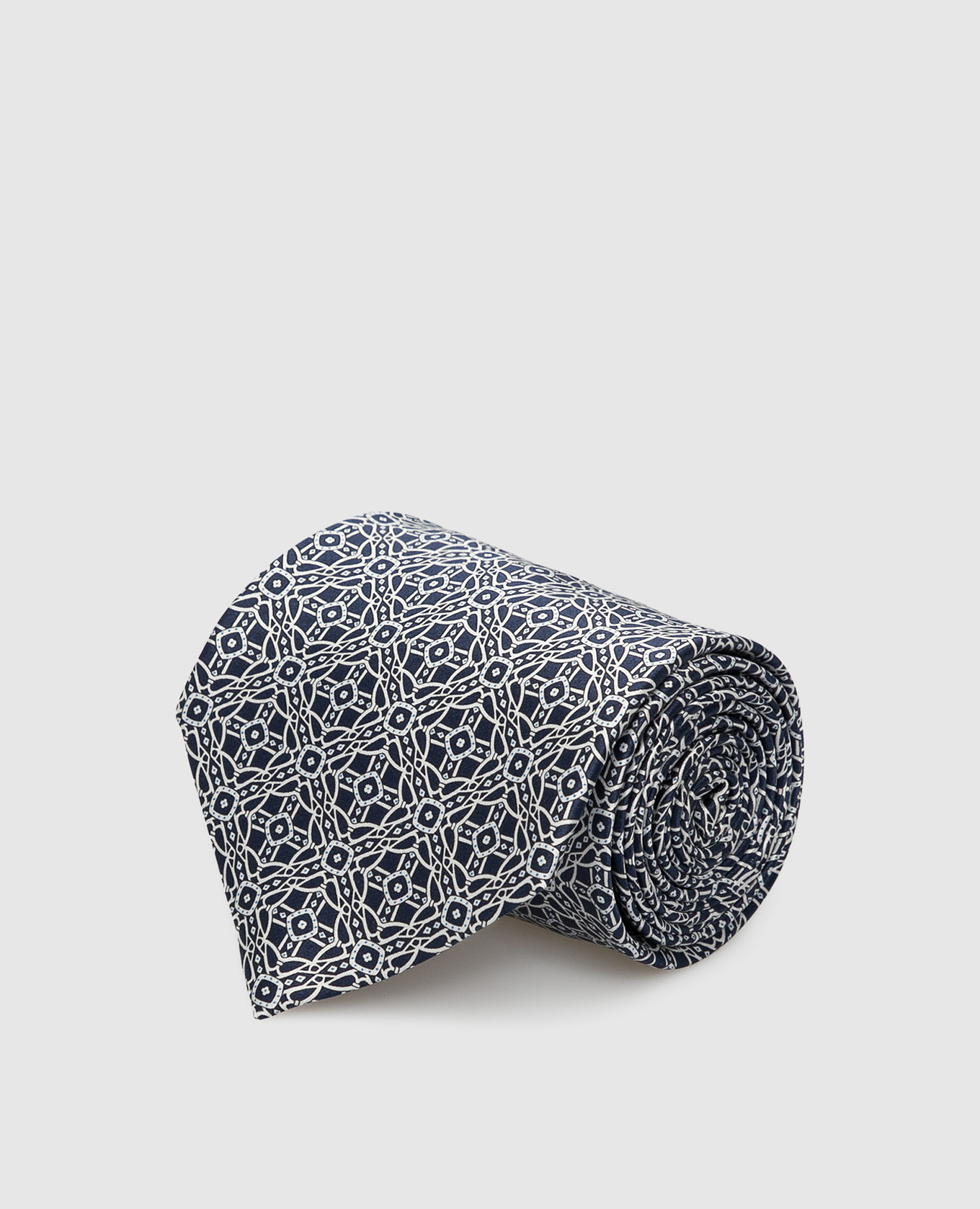 Dark blue silk tie in a geometric pattern