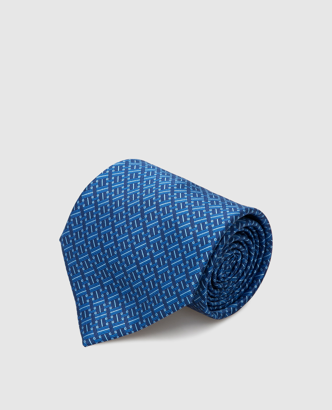 Blue silk tie in geometric pattern