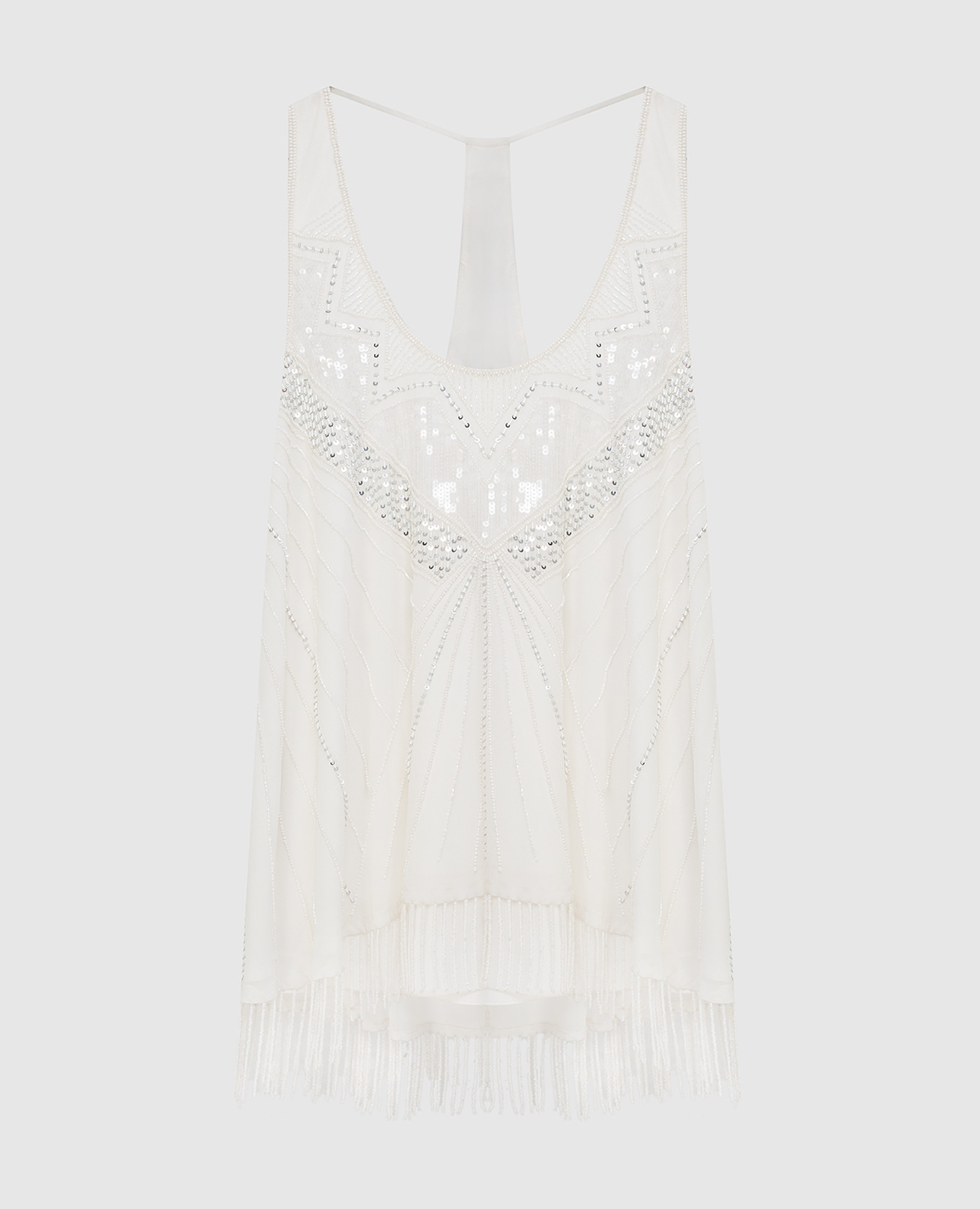 White top with embroidery and fringes