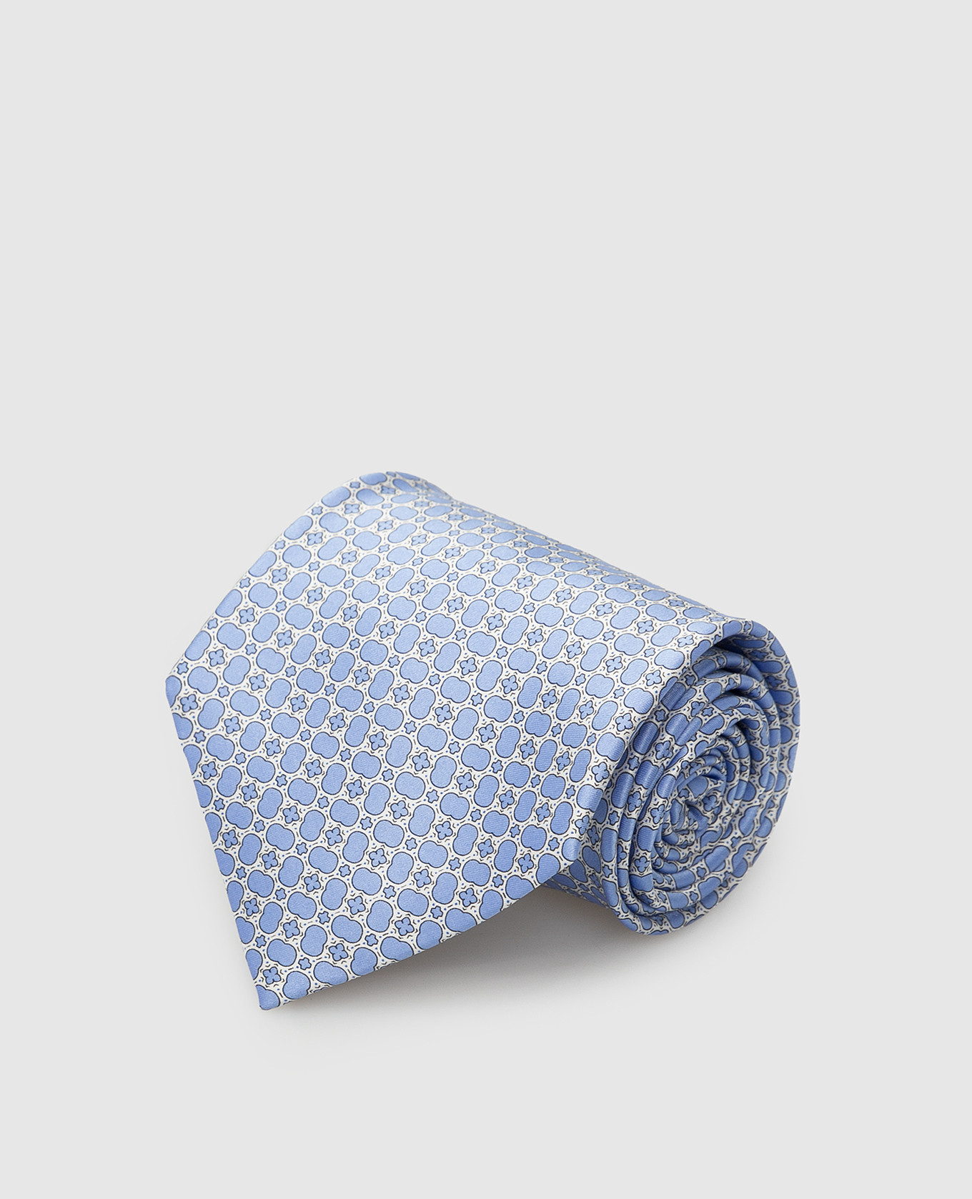 Блакитна краватка у візерунок