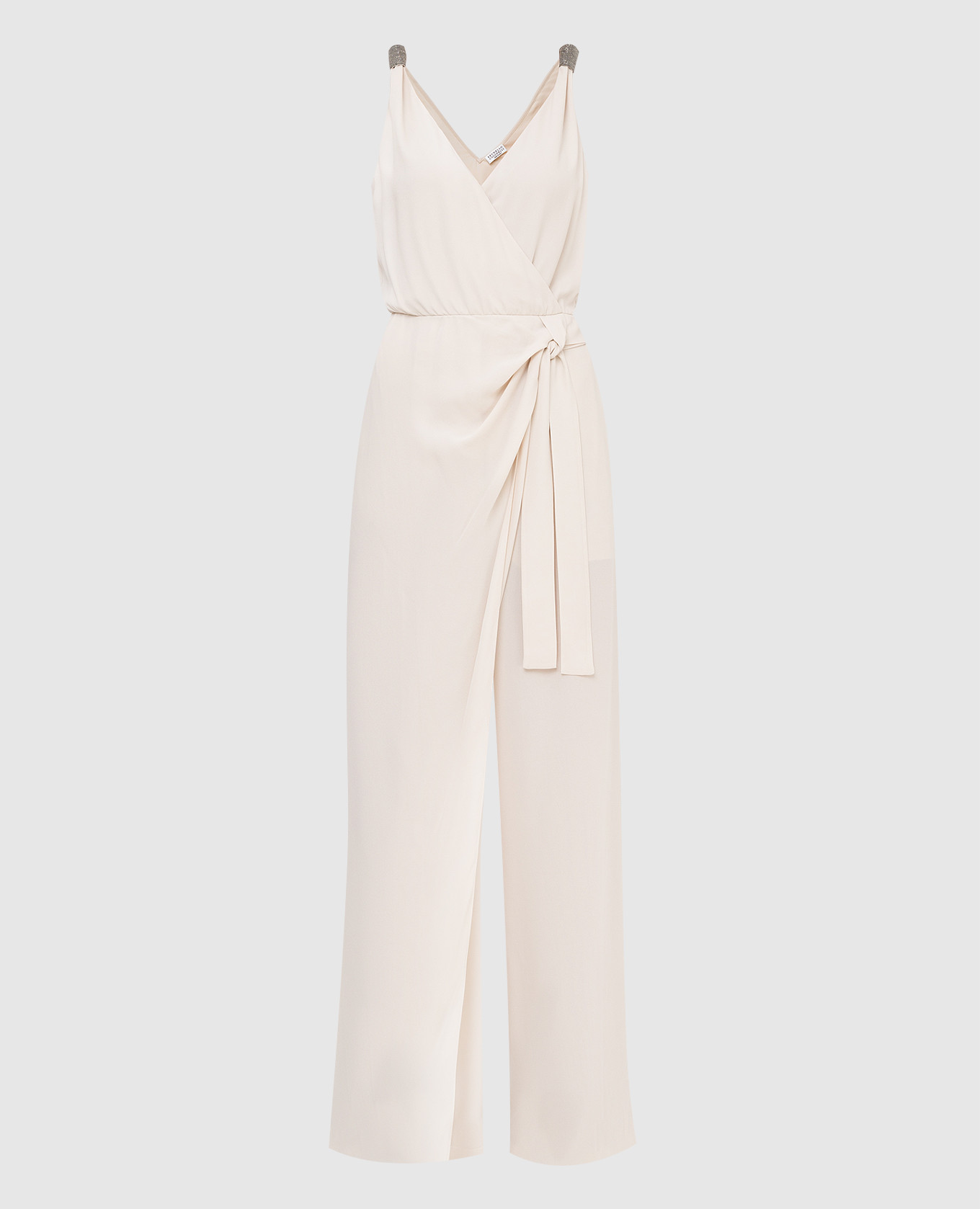 Light beige silk jumpsuit with slit and chains