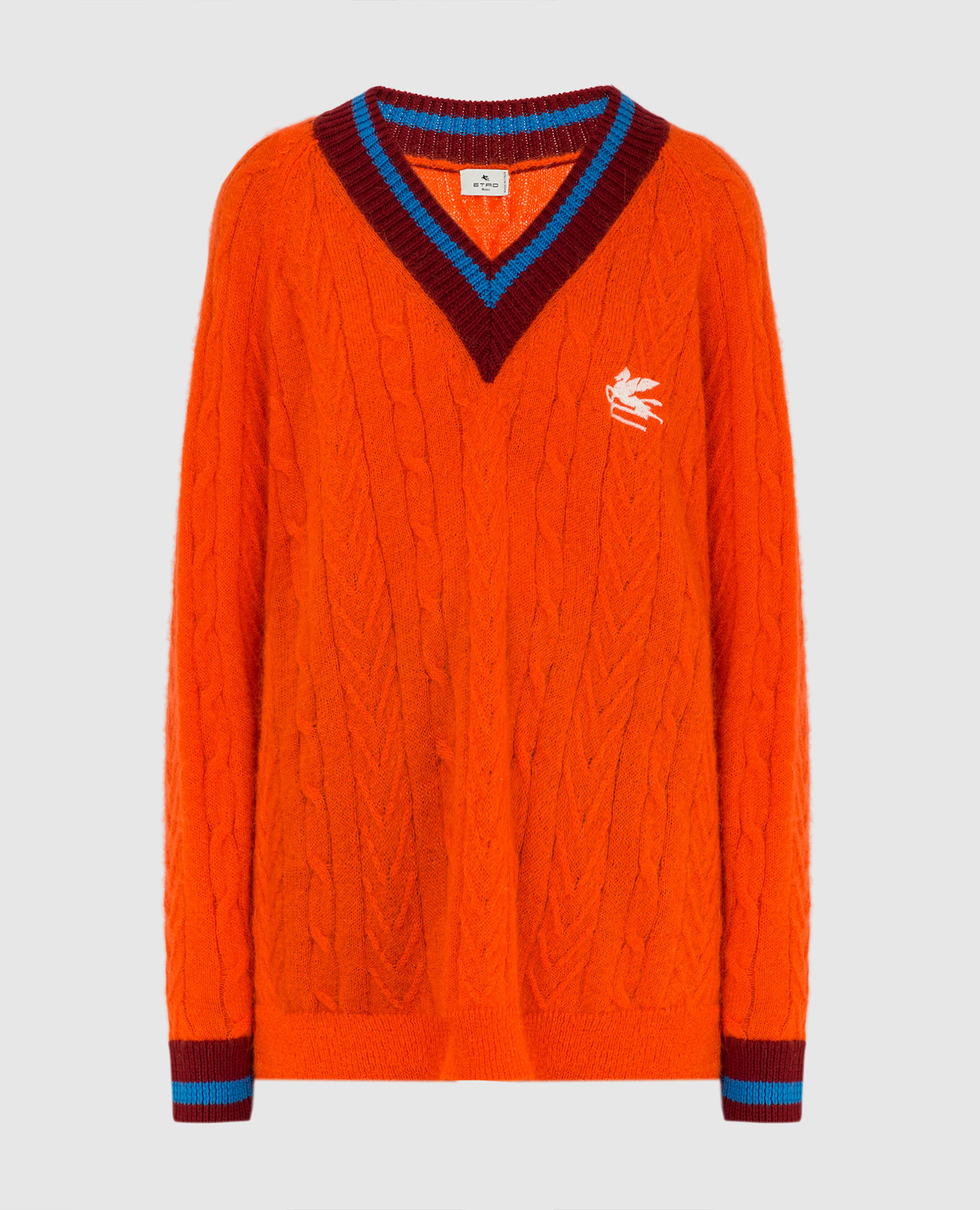 Оранжевый пуловер с контрастными вставками